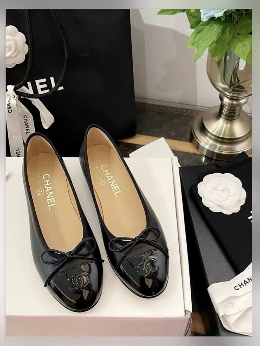 CHANEL Black Two-Tone Cap Toe Bow Ballet Flats